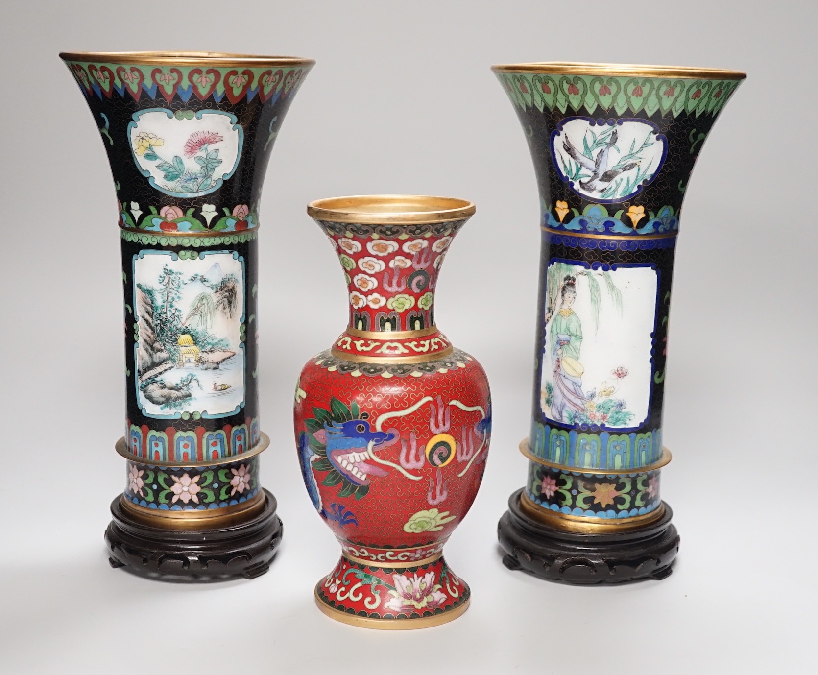 A pair of Chinese cloisonné enamel beaker vases and a dragon vase, pair of vases 27cm